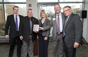Harper recognizes Northwest Community Healthcare with a plaque