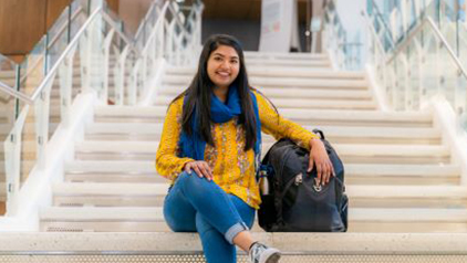 Meha Patel on the Harper library steps